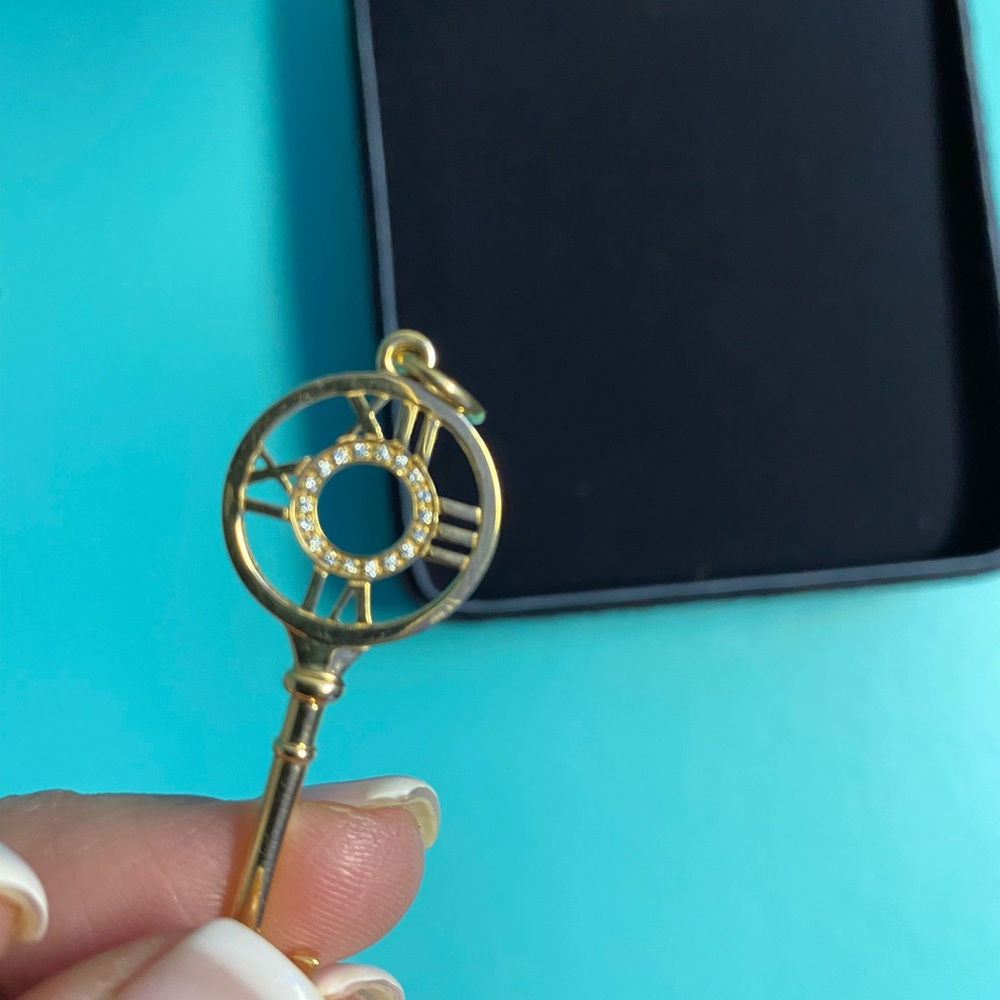 Gold Key-Shaped Phone Accessory